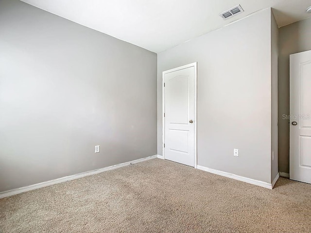 313 Sofia Ln, Lake Alfred, FL 33850 - spare room with light carpet and baseboards