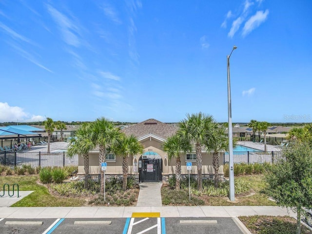 313 Sofia Ln, Lake Alfred, FL 33850 - view of property with uncovered parking and a fenced front yard