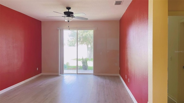 12630 Old Plantation Ln, Orlando, FL 32824 - spare room with ceiling fan and wood finished floors