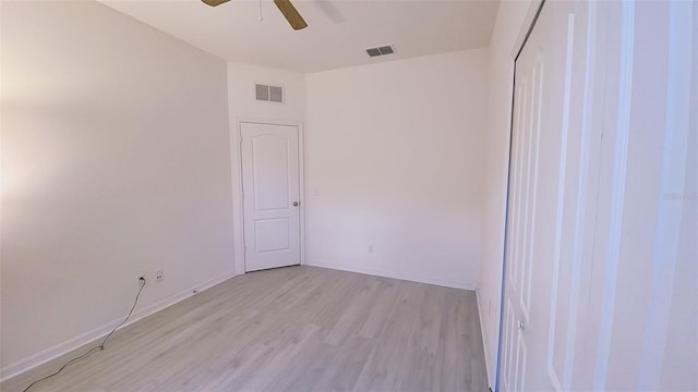 12630 Old Plantation Ln, Orlando, FL 32824 - unfurnished room featuring a ceiling fan and light wood-style flooring