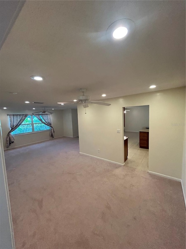 9504 W Cluster Ave, Tampa, FL 33615 - basement with light carpet, recessed lighting, and a ceiling fan