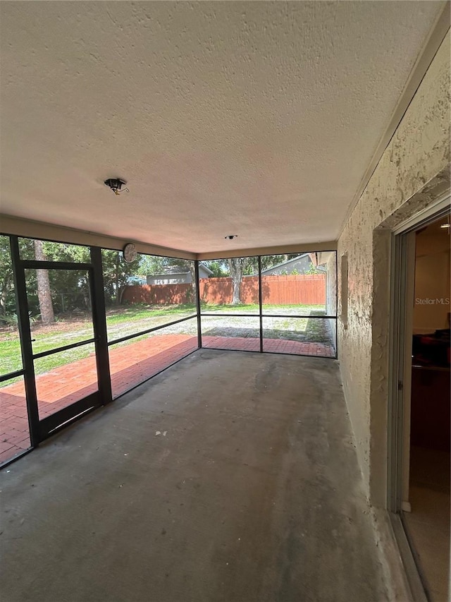 9504 W Cluster Ave, Tampa, FL 33615 - unfurnished sunroom featuring plenty of natural light