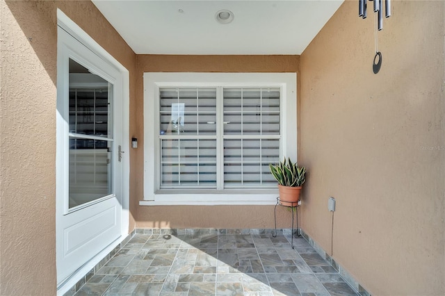 13217 Briar Forest Ct, Orlando, FL 32828 - entrance to property featuring stucco siding