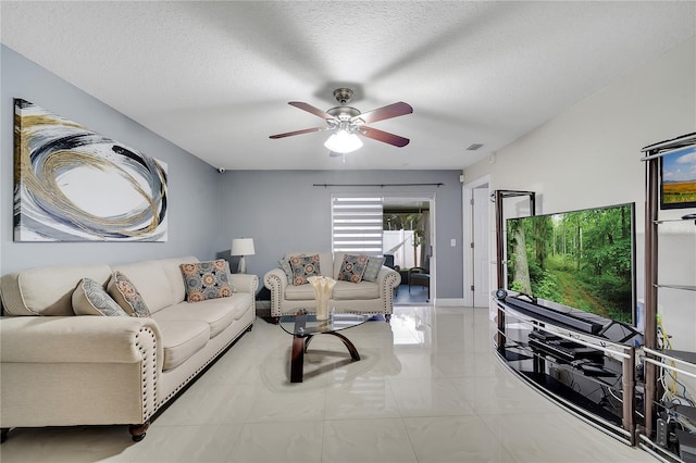 13217 Briar Forest Ct, Orlando, FL 32828 - living area with ceiling fan and a textured ceiling