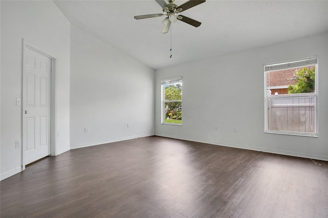 118 Sir Phillips Dr, Davenport, FL 33837 - empty room featuring dark wood finished floors, ceiling fan, and lofted ceiling