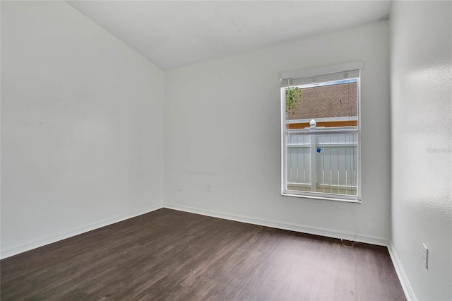 118 Sir Phillips Dr, Davenport, FL 33837 - unfurnished room with wood finished floors and baseboards