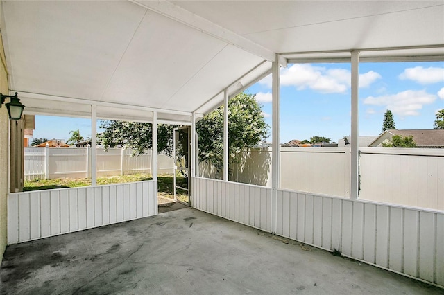 118 Sir Phillips Dr, Davenport, FL 33837 - unfurnished sunroom with lofted ceiling