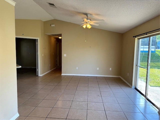 2207 Robel Trl, Clermont, FL 34714 - unfurnished room featuring lofted ceiling, ceiling fan, light tile patterned floors, and a textured ceiling