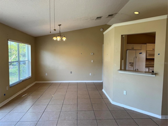 2207 Robel Trl, Clermont, FL 34714 - unfurnished room featuring a textured ceiling, a chandelier, light tile patterned flooring, vaulted ceiling, and crown molding