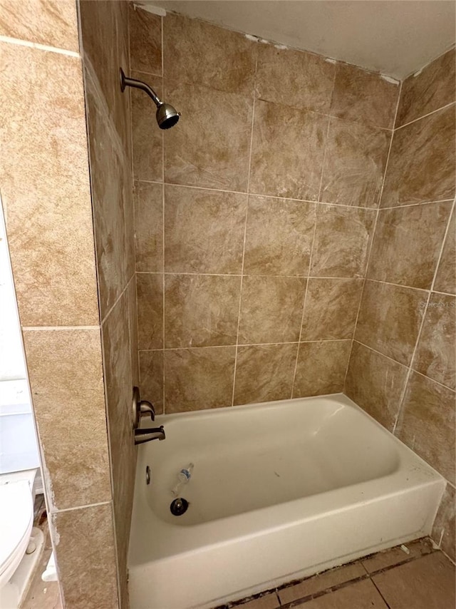 2207 Robel Trl, Clermont, FL 34714 - full bath with tile patterned flooring and bathing tub / shower combination