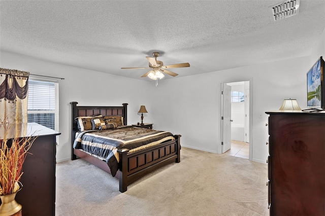 141 Winsor Ave, Davenport, FL 33837 - carpeted bedroom with a textured ceiling and a ceiling fan