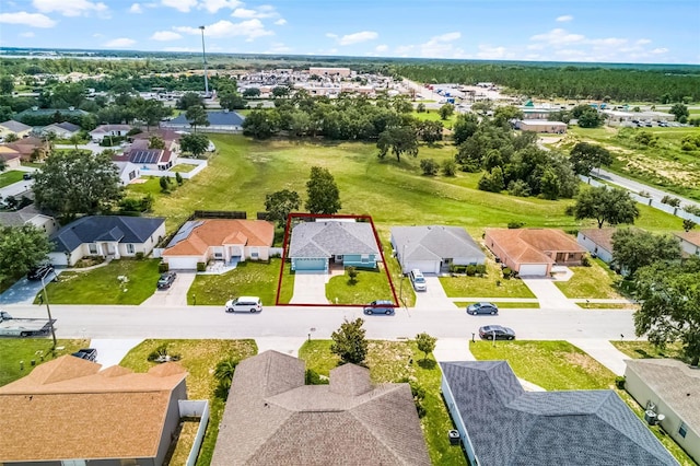 141 Winsor Ave, Davenport, FL 33837 - aerial view of residential area featuring property parcel outlined