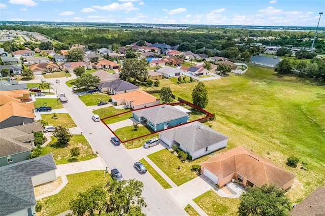 141 Winsor Ave, Davenport, FL 33837 - aerial perspective of suburban area featuring property parcel outlined