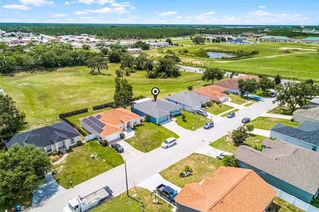 141 Winsor Ave, Davenport, FL 33837 - aerial perspective of suburban area with a nearby body of water