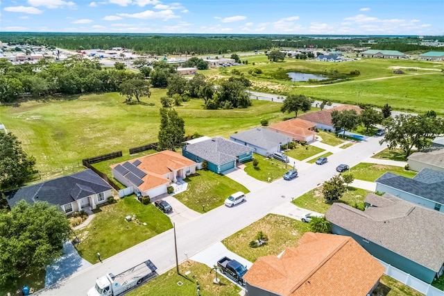 141 Winsor Ave, Davenport, FL 33837 - aerial perspective of suburban area featuring a nearby body of water