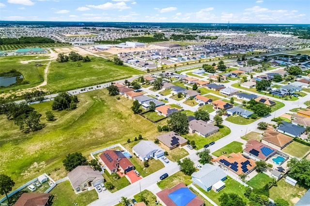 141 Winsor Ave, Davenport, FL 33837 - aerial view of property's location with nearby suburban area and a nearby body of water