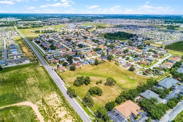 141 Winsor Ave, Davenport, FL 33837 - aerial overview of property's location featuring nearby suburban area