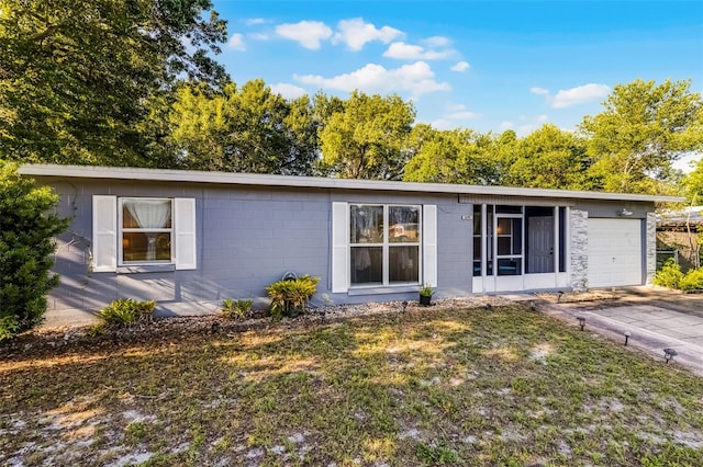 1649 Weybridge St, Deltona, FL 32725 - single story home with a garage, concrete block siding, and concrete driveway