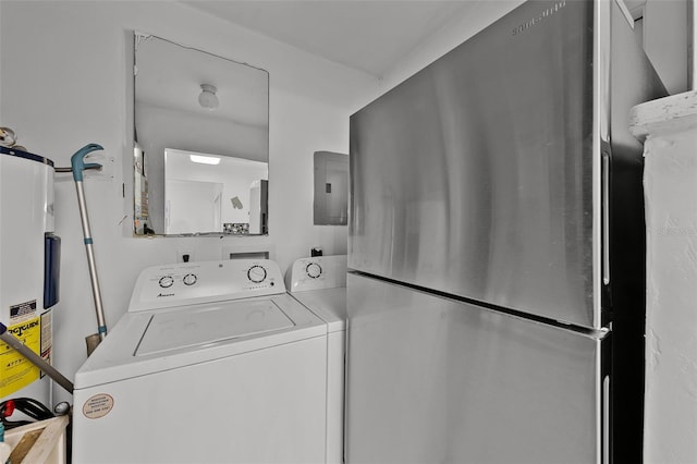 1649 Weybridge St, Deltona, FL 32725 - washroom featuring water heater, washing machine and dryer, and electric panel