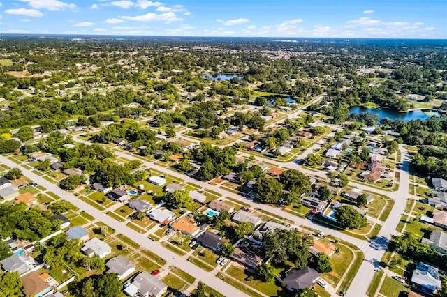 1649 Weybridge St, Deltona, FL 32725 - aerial overview of property's location with a large body of water and nearby suburban area