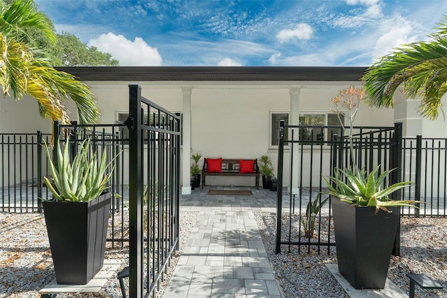 9353 Gotha Rd, Windermere, FL 34786 - gate with covered porch