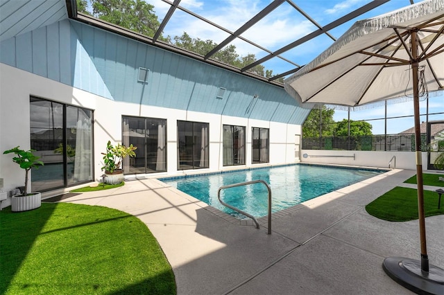 9353 Gotha Rd, Windermere, FL 34786 - view of swimming pool featuring a patio, glass enclosure, and a lawn