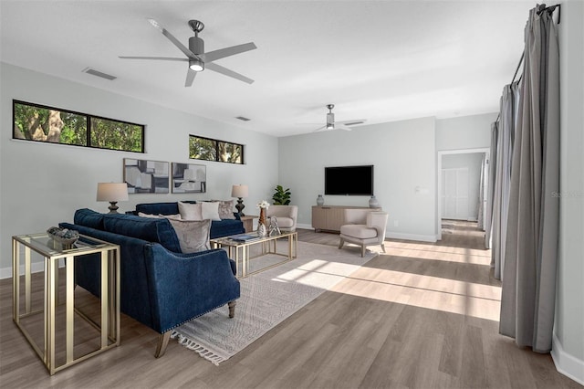 9353 Gotha Rd, Windermere, FL 34786 - living area featuring ceiling fan and wood finished floors