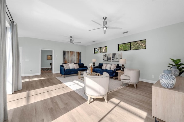 9353 Gotha Rd, Windermere, FL 34786 - living area featuring wood finished floors and ceiling fan