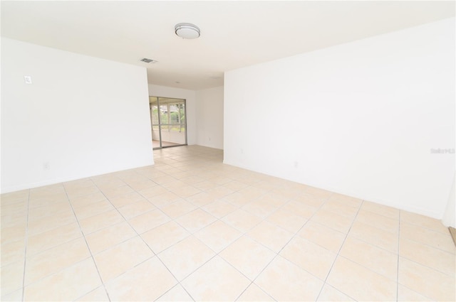 4469 Evers Pl, Orlando, FL 32811 - unfurnished room with light tile patterned floors