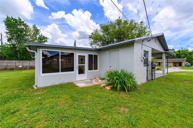 4469 Evers Pl, Orlando, FL 32811 - rear view of house featuring stucco siding