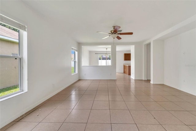 5145 Prairie View Way, Wesley Chapel, FL 33545 - spare room featuring light tile patterned flooring and a ceiling fan