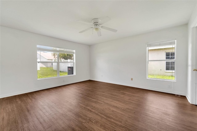 5145 Prairie View Way, Wesley Chapel, FL 33545 - unfurnished room featuring dark wood-type flooring and a ceiling fan