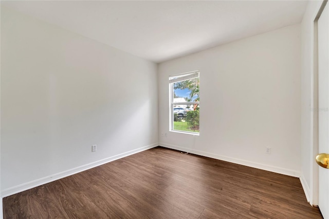 5145 Prairie View Way, Wesley Chapel, FL 33545 - unfurnished room featuring dark wood finished floors and baseboards