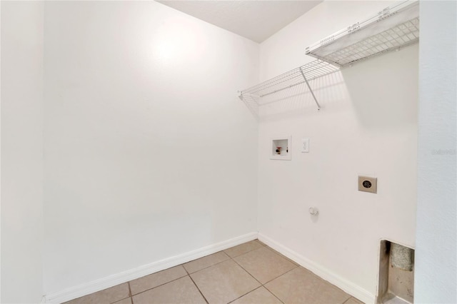 5145 Prairie View Way, Wesley Chapel, FL 33545 - laundry room featuring electric dryer hookup, hookup for a washing machine, and light tile patterned floors