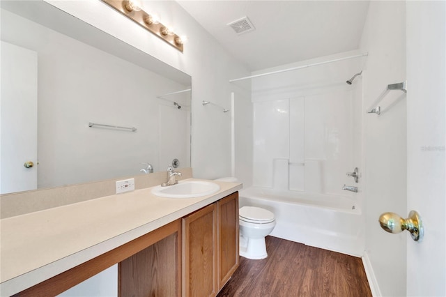 5145 Prairie View Way, Wesley Chapel, FL 33545 - bathroom with vanity, bathing tub / shower combination, and wood finished floors