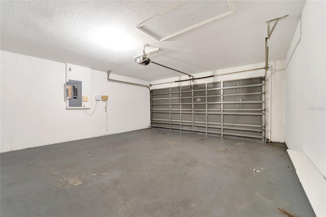 5145 Prairie View Way, Wesley Chapel, FL 33545 - garage with electric panel and a garage door opener