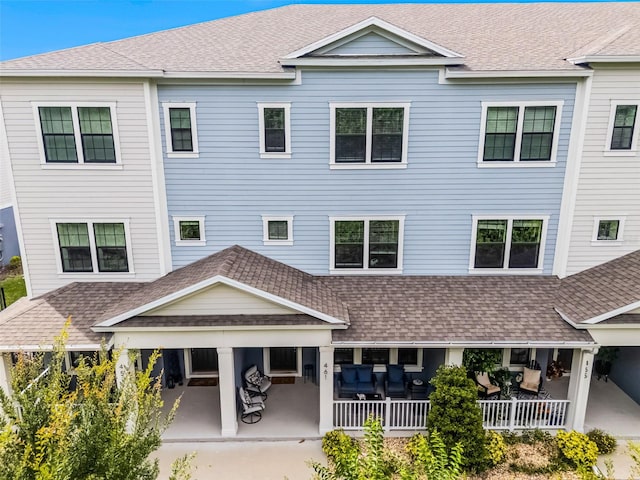 461 Diamond Dove Cv, Winter Springs, FL 32708 - rear view of property with a patio area and a shingled roof