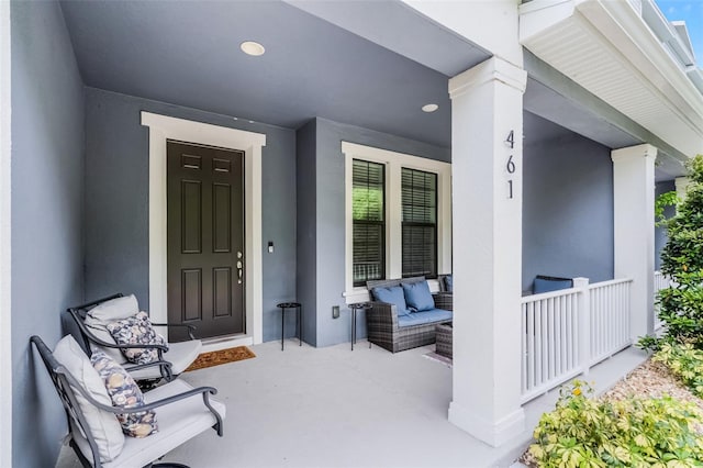 461 Diamond Dove Cv, Winter Springs, FL 32708 - property entrance with covered porch and stucco siding