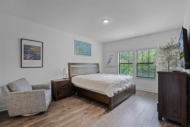 461 Diamond Dove Cv, Winter Springs, FL 32708 - bedroom with a textured ceiling, wood finished floors, and recessed lighting