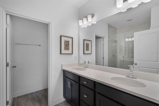 461 Diamond Dove Cv, Winter Springs, FL 32708 - full bath featuring a shower stall, double vanity, and wood finished floors