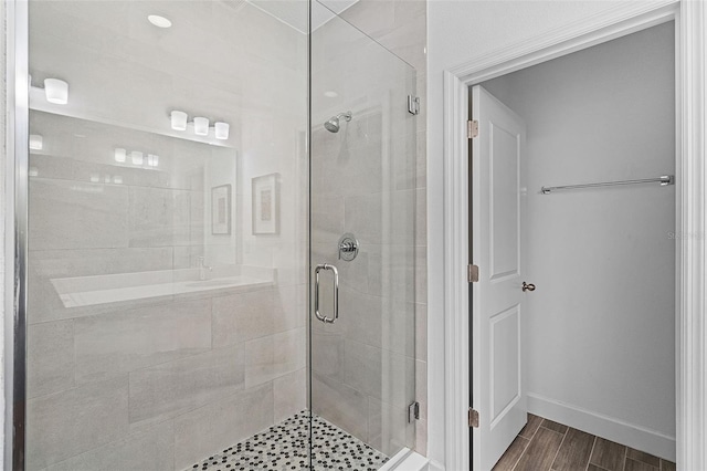 461 Diamond Dove Cv, Winter Springs, FL 32708 - full bath with a stall shower and wood finished floors