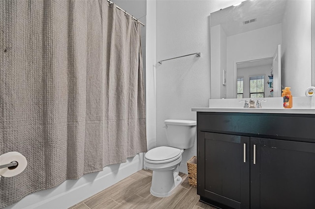 461 Diamond Dove Cv, Winter Springs, FL 32708 - full bath with wood finished floors, vanity, and shower / bath combination with curtain