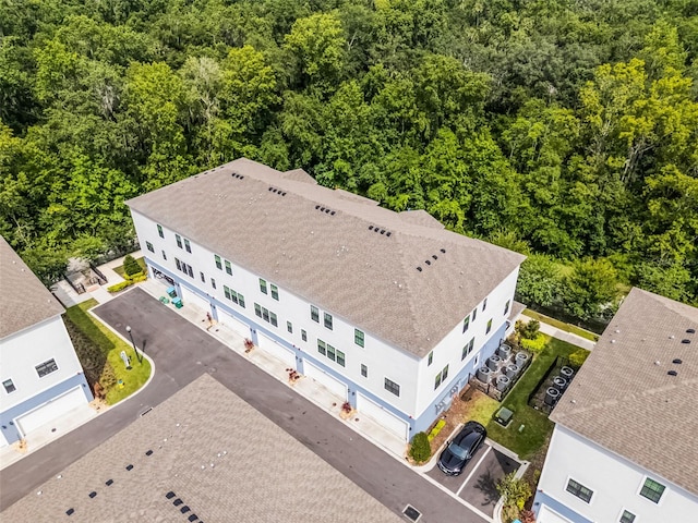 461 Diamond Dove Cv, Winter Springs, FL 32708 - aerial view of property and surrounding area with a heavily wooded area
