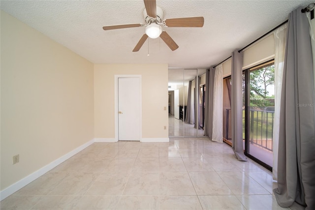 5365 Elm Ct Unit 331, Orlando, FL 32811 - unfurnished room with a textured ceiling and ceiling fan