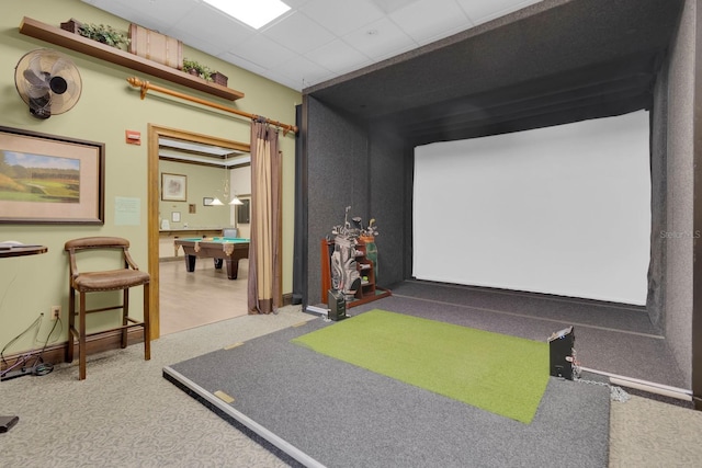 recreation room featuring golf simulator, carpet, a drop ceiling, and pool table