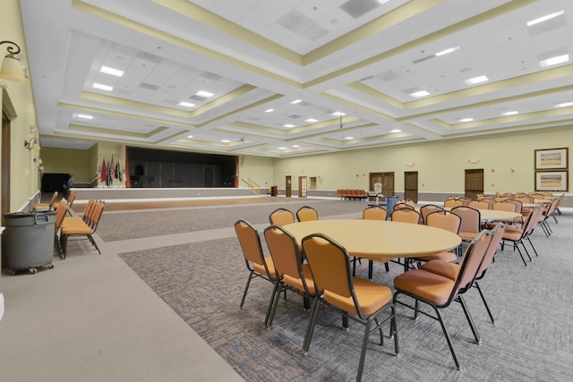 dining room featuring carpet floors and coffered ceiling