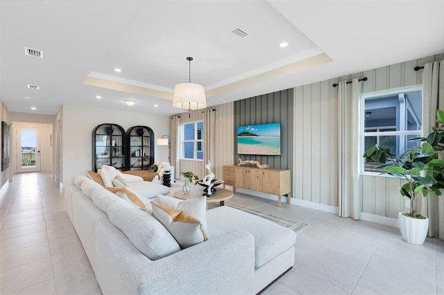 1530 Groveline Rd, Saint Cloud, FL 34771 - living area featuring a tray ceiling, light tile patterned floors, and recessed lighting