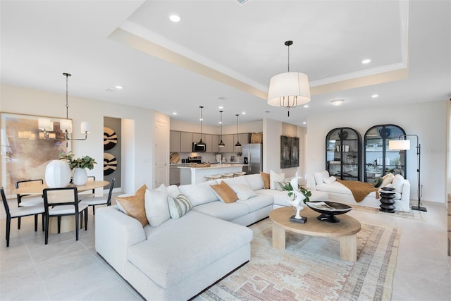 1530 Groveline Rd, Saint Cloud, FL 34771 - living area featuring a raised ceiling, a chandelier, recessed lighting, light tile patterned flooring, and crown molding
