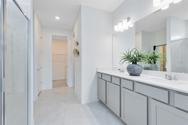 1530 Groveline Rd, Saint Cloud, FL 34771 - full bath featuring double vanity, a stall shower, a walk in closet, and recessed lighting