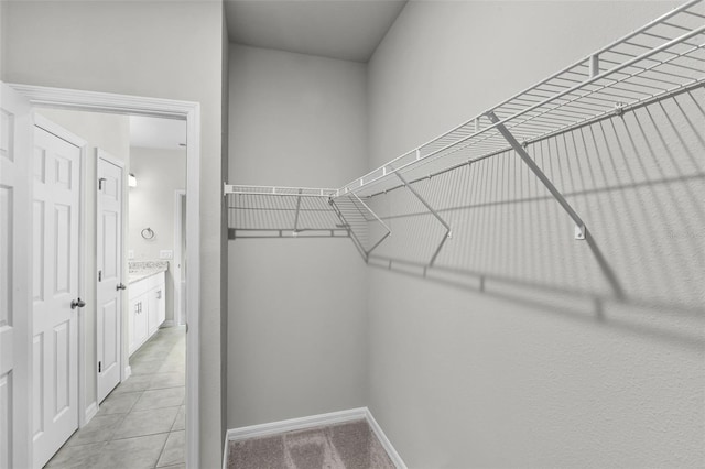 505 Venetian Palms Blvd, New Smyrna Beach, FL 32168 - spacious closet with light tile patterned floors
